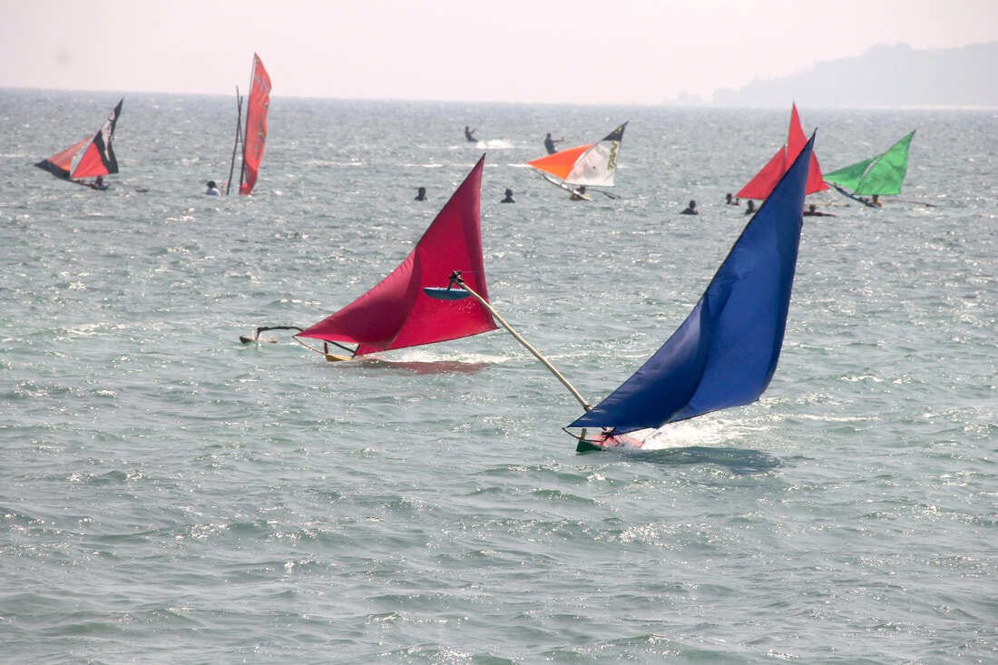 Jongs lined up on the sand at Teluk Bakau