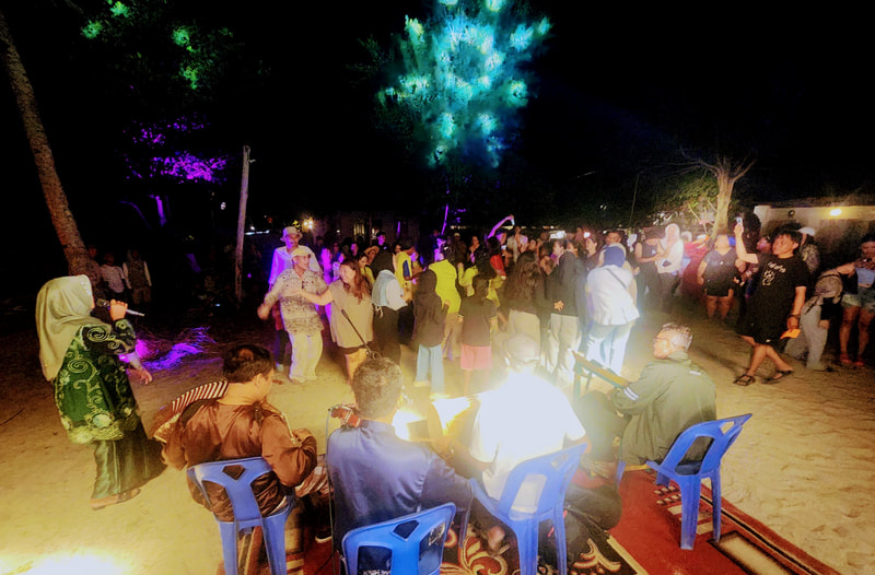 Evening performances on the beach after the race